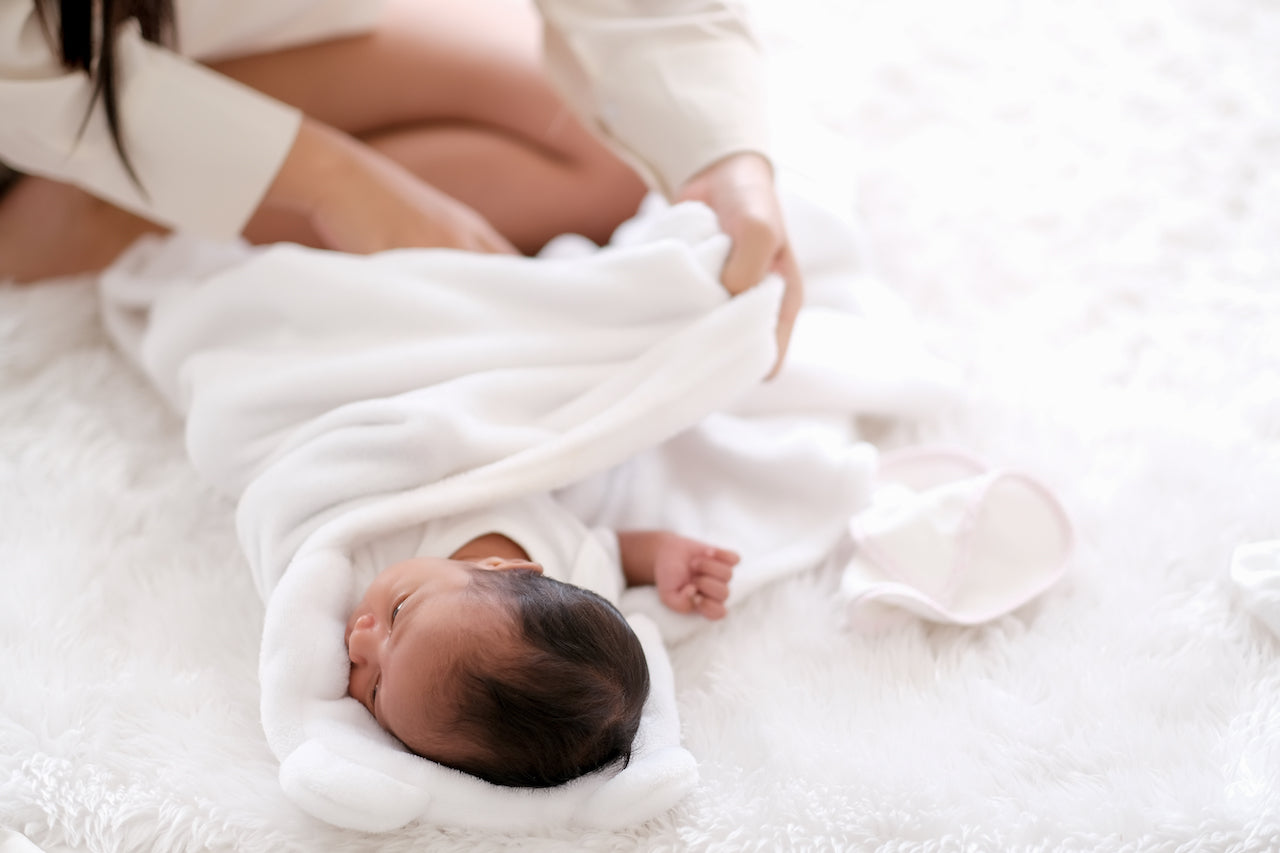 Swaddling after baby can roll online over